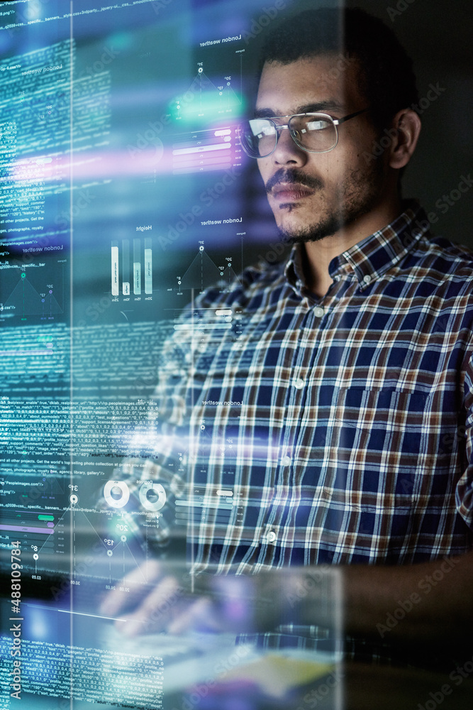 Poster Going through the source code. Cropped shot of a young computer programmer looking through data.