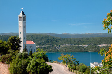 Fototapeta na wymiar View of adriatic sea and seaside village from Bosnia and Herzegovina to Croatia