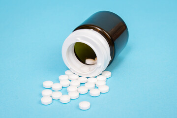 Medicine and healthcare. Tablets in a drug bottle.