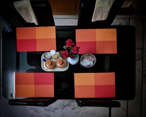 Top view of modern dining room interior,table, chairs.indian style dinning table and chairs, A modern wooden dinning table prepared for dinner. Top view, flat,luxury.