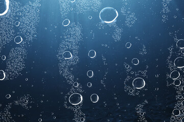 air bubbles underwater blue background, ocean depth diving