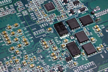 Details of electronic board. Close-up of electronic circuit board with SMD components, microcircuits and chips