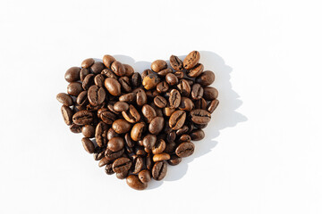 Heart shape of Robusta, Arabica coffee beans isolated on white background. I love coffee. Coffee love concept