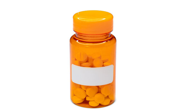  Medical vial with pills and empty label without text. Medical pills in orange Plastic Prescription. most popular medicine