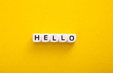 Plastic block with HELLO word on yellow background © chee siong teh