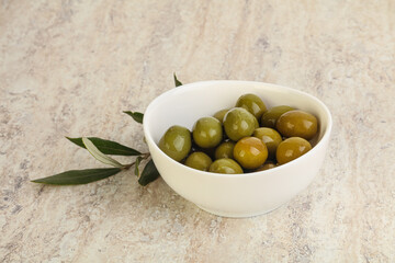 Tasty marinated olives in the bowl