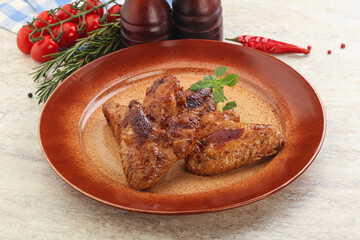 Roasted chicken wings with spicy sauce
