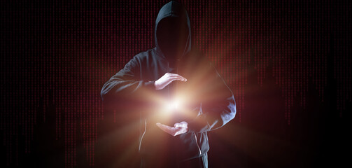 Hacker security cyber attack. Hacker man hand isolated on black. Blurred internet web hack...