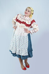 Beautiful woman in Hungarian national folk clothes dress on white background