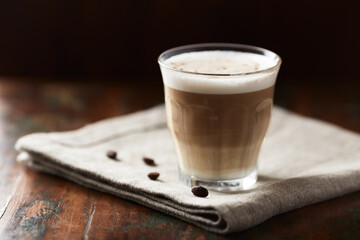 Coffee with milk on wooden background. Soft focus. Copy space.	