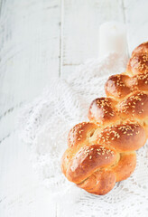 Challah bread. Sabbath kiddush ceremony composition. Freshly baked homemade braided challah bread...