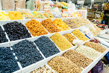 Makhachkala, Russia - October, 2021: dried fruits and nuts are sold in the food market in the city Makhachkala of Republic of Dagestan.
