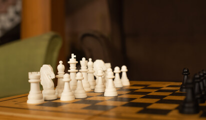 Wooden chess vintage board with white and black figures