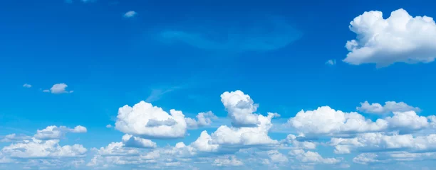 Poster blue sky with clouds.panoramic blue sky background with small clouds. © Mohwet