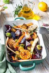 Grilled and roasted root vegetables with herbs. Healthy simple food