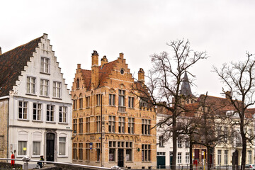 Fototapeta na wymiar Traditional style buildings in Langerei street in Historic city of Bruges, Belgium