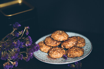 Healthy oatmeal cookies on a dark background