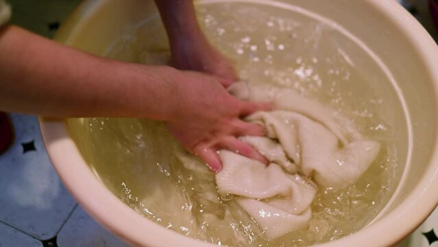 A woman who washes clothes