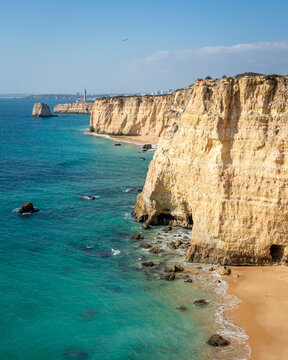 Rocky cliffs and golden sand beaches in southern Portugal 2