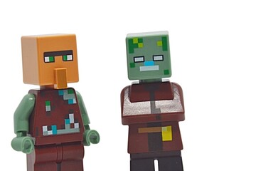 Naklejka premium LEGO Minecraft switched heads - villager head with body of drowned zombie and zombie head with body of villager. White background