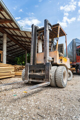 Fototapeta na wymiar Forklift loader for warehouse fork lifter ready for work