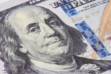 Obraz na płótnie Canvas Benjamin Franklin portrait , US dollars banknote. Vertical close up Old portrait. 