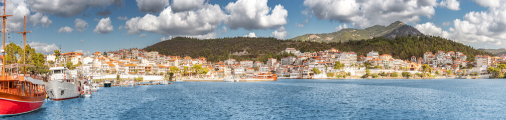 Wide panorama of a resort town Neos Marmaras in Halkidiki, Sithonia. Travel destinations and real estate in Greece