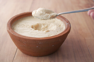 fresh yogurt in a bowl on table 