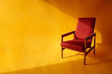 red chair on yellow background