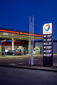 Price display in front of a gas station (tankstelle) at night. High and expensive fuel prices in europe. Total. Denkendorf, Germany 2022.