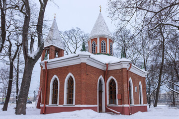 St.Petersburg, Russia -January, 09 2022: ..Church of the Nativity of John the Baptist on Kamenny Island, covered with snow on a winter day.