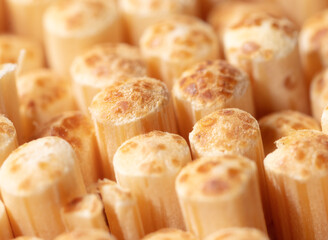 Close up of wooden toothpicks as background.