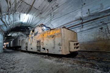 Electric locomotive in an underground tunnel
