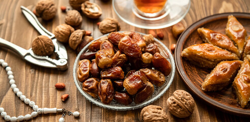 Dates, rosaries and baklava. Ramadan Selective focus