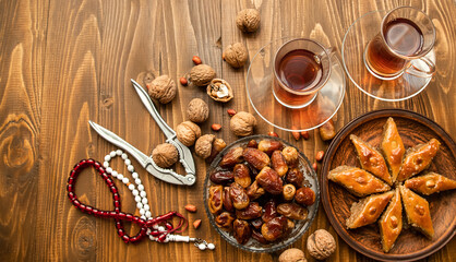 Dates, rosaries and baklava. Ramadan Selective focus