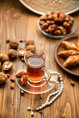 Dates, rosaries and baklava. Ramadan Selective focus
