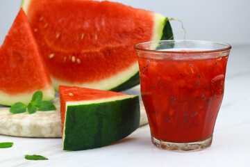 Es Semangka or Watermelon ice drink on isolated white background. Selective focus, copy space for text. 