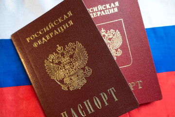 Passports of the Russian Federation on the background of the Russian flag
