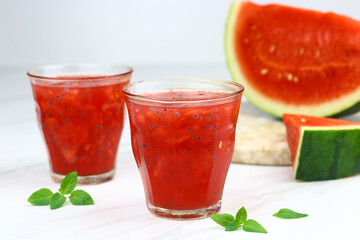 Es Semangka or Watermelon ice drink on isolated white background. Selective focus, copy space for text. 