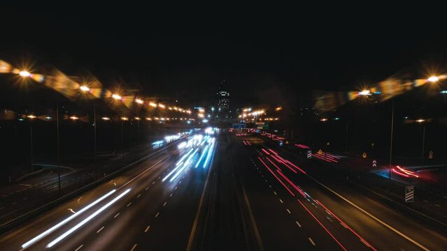 Night time lapse of busy highway