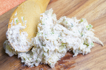 Chicken salad cold food in cutting board