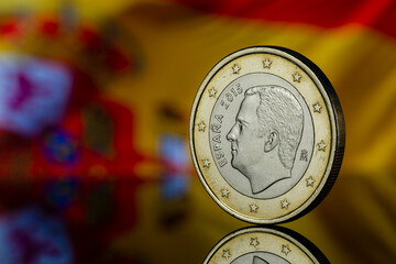 Philip Felipe VI King of Spain Euro Coin with Spain Flag Blurred in the Background