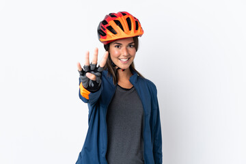 Young cyclist brazilian girl isolated on white  background happy and counting four with fingers