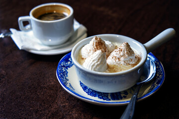 leche nevada dessert with coffee cup