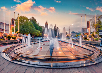 Fantastic evening view of fountain in Central Park of Bitola city. Wonderful sunset in North Macedonia, Europe. Traveling concept background.