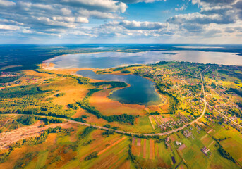 Breathtaking summer view from flying drone of Svityaz Lake. Fabulous morning scene of Shatsky...