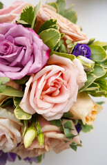 Bouquet of flowers - a composition of multi-colored roses.
