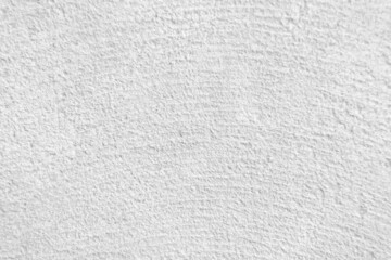 Fototapeta na wymiar Seamless texture of white cement wall a rough surface, with space for text, for a background.