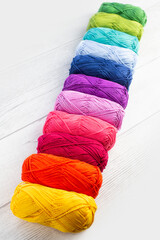 Rainbow colored skeins of yarn