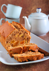 Apricot, apple and nut cake, sliced